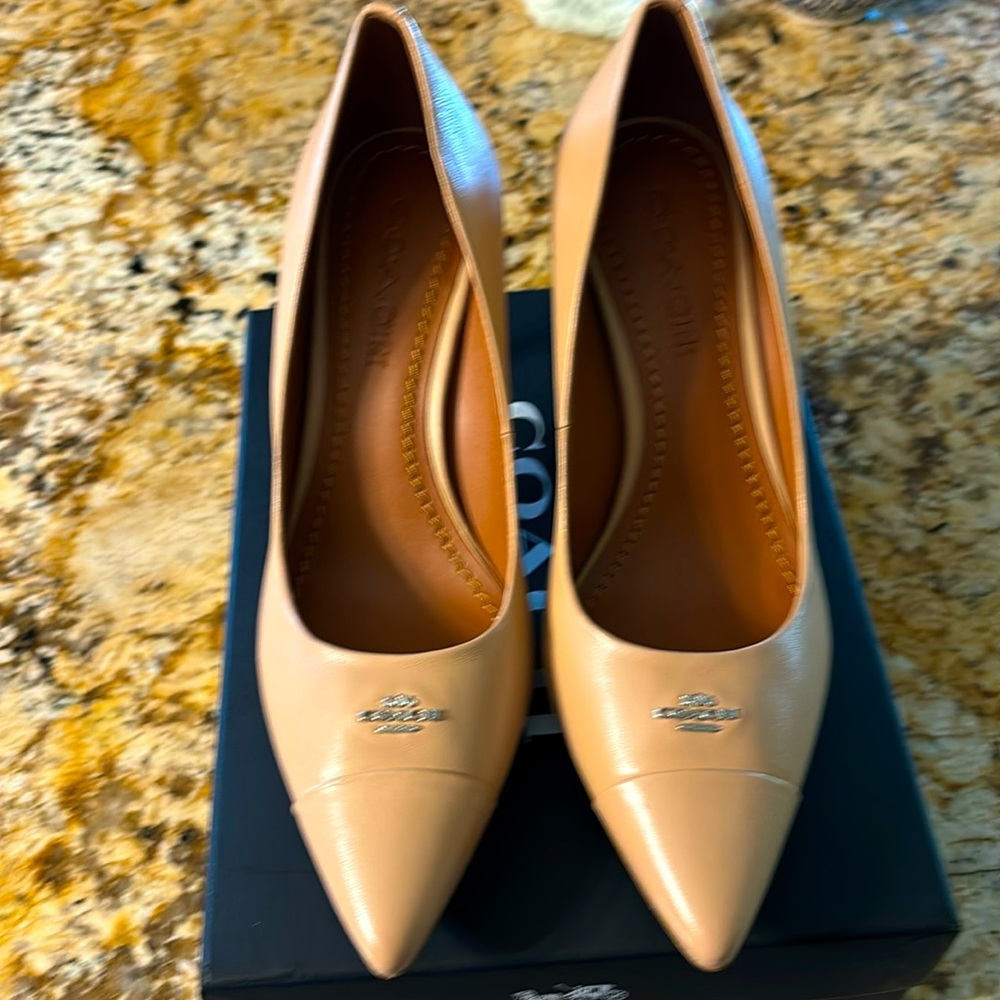 Coach pumps